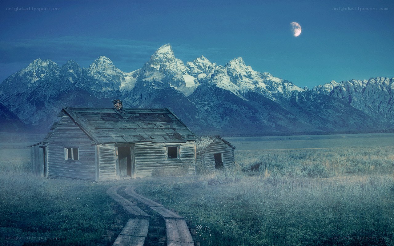 Abandoned cabin in mountain valley