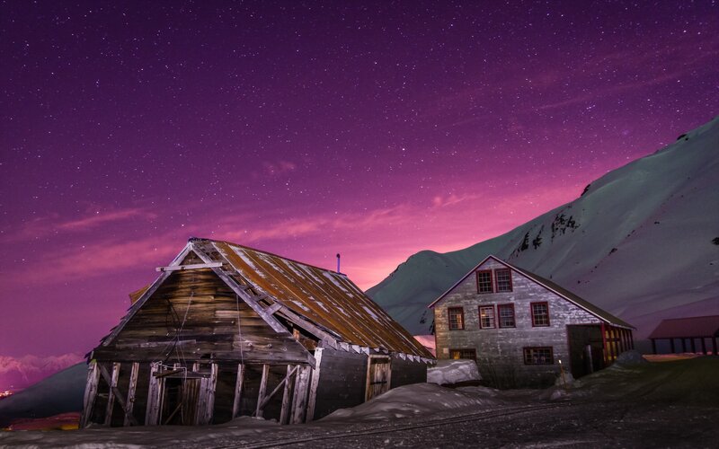 Abandoned Cabins at Night