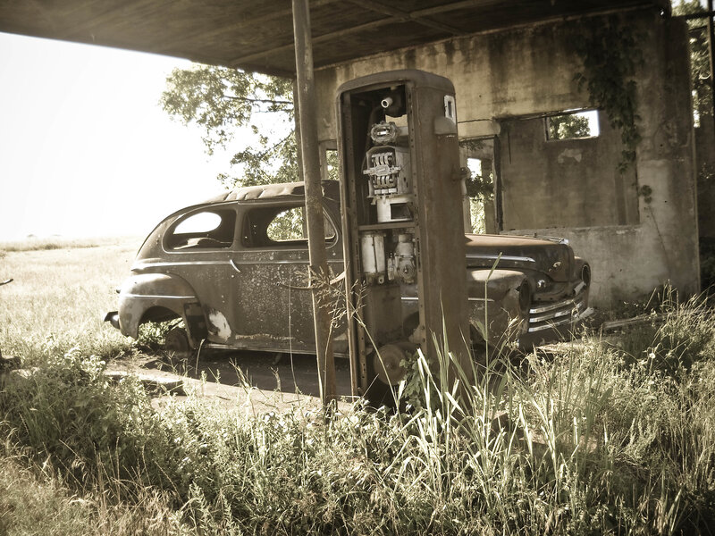 Abandoned car and gas pump