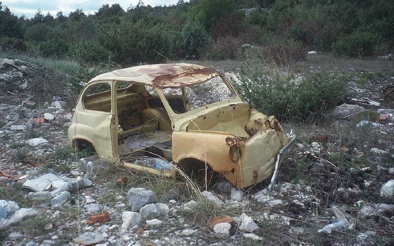 Abandoned car in a junkyard