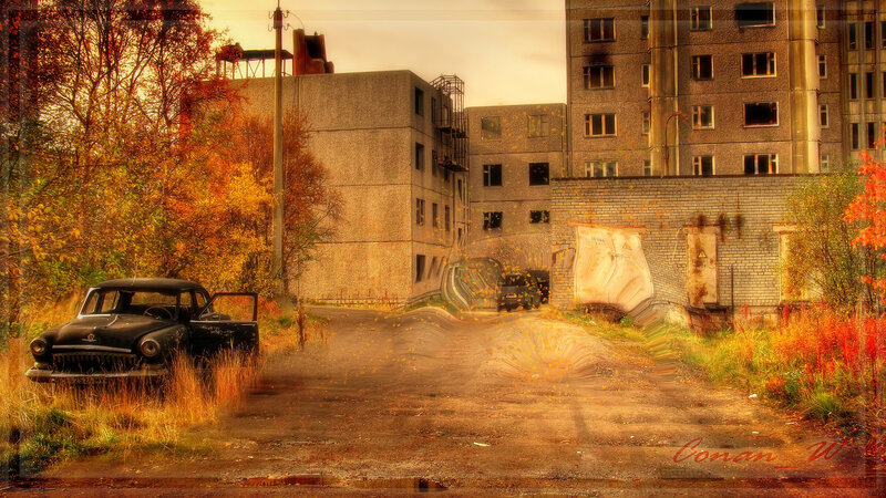 Abandoned car in autumn city