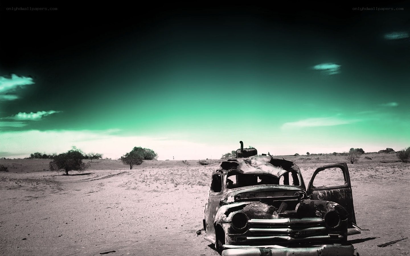 Abandoned car in desert