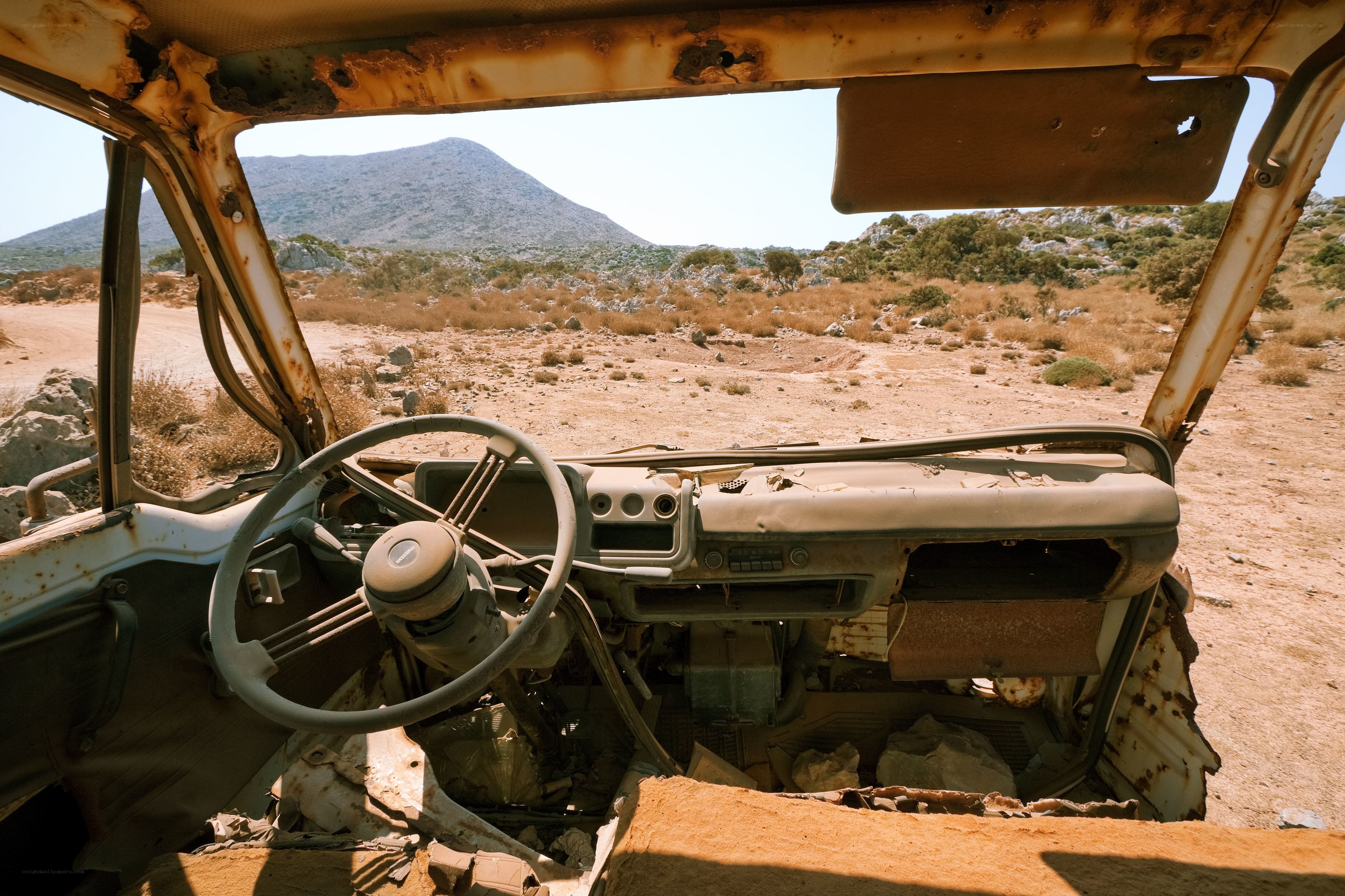 abandoned car in desert