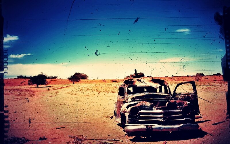 Abandoned car in desert