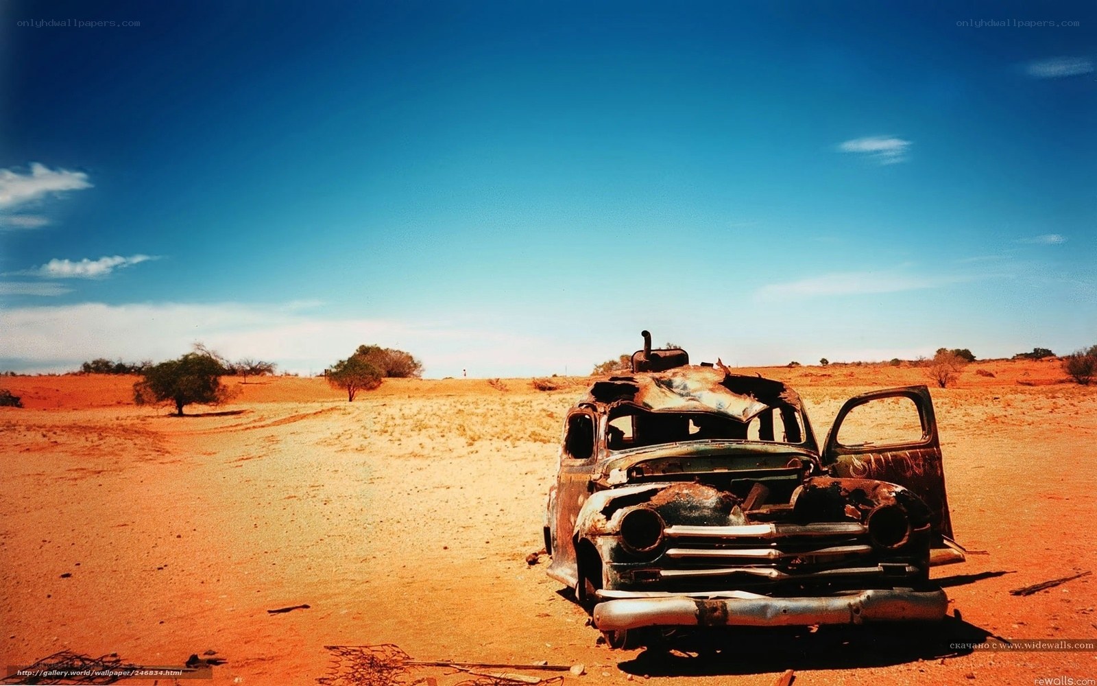 Abandoned car in desert