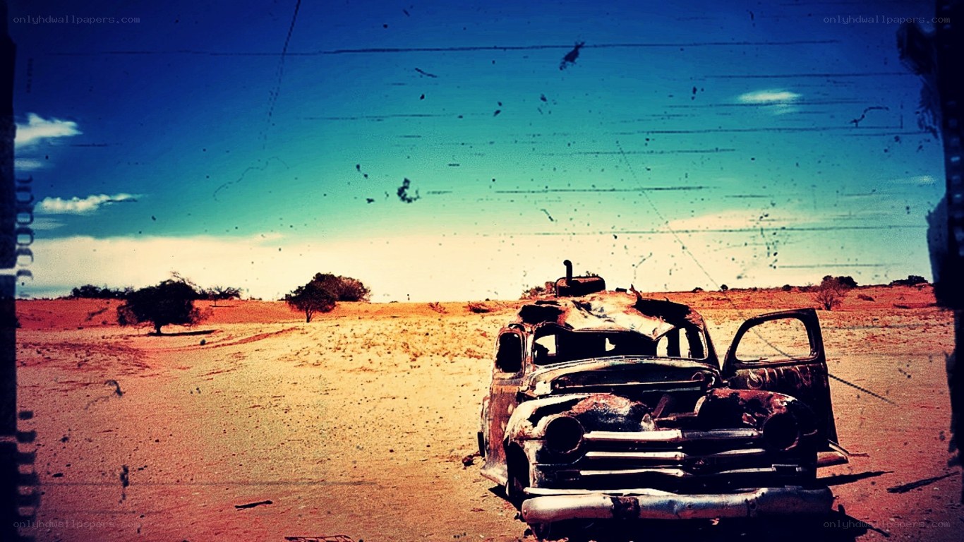 Abandoned car in desert
