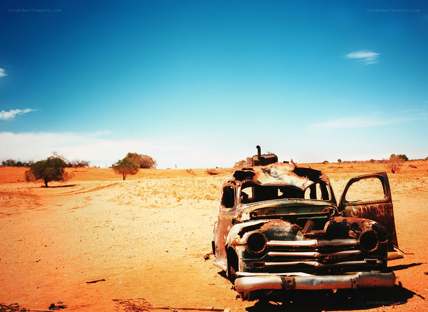 Abandoned car in desert