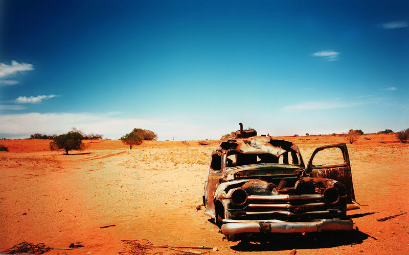Abandoned Car in Desert — Blue, Dramatic, Afternoon, Photograph, Sky, Trees, Orange, Brown