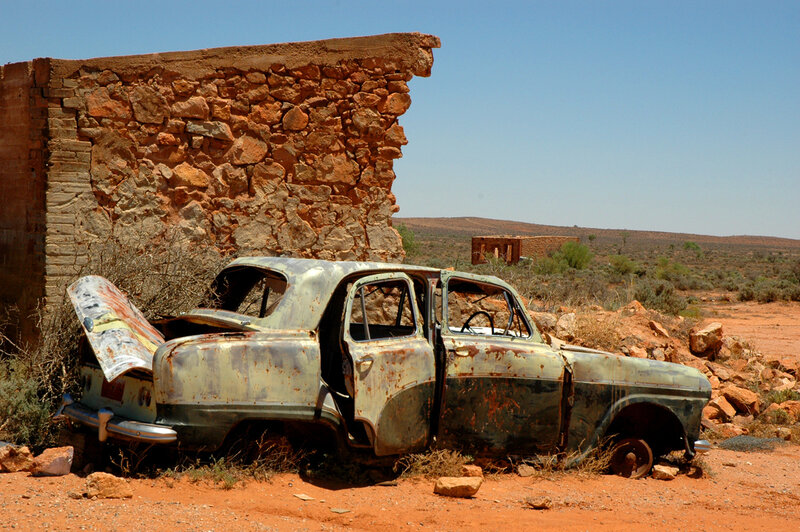 Abandoned Car in Desert — Brown