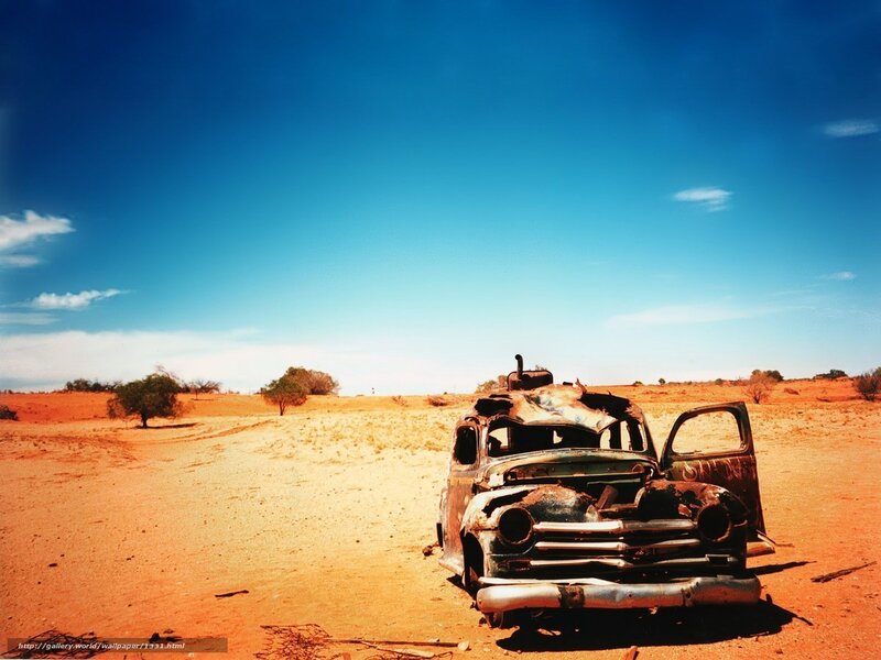 Abandoned car in desert