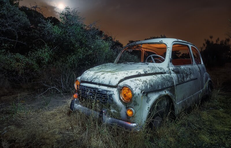 Abandoned Car in Field — White, Dramatic