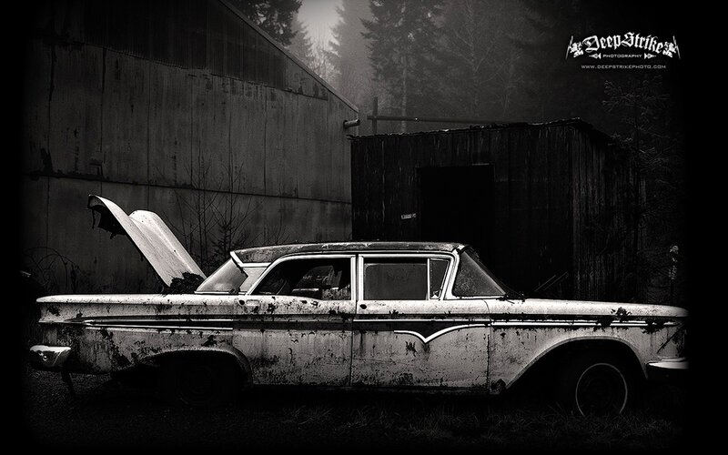 abandoned car in fog