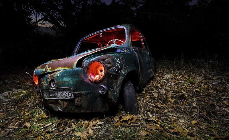 Abandoned Car in Forest — Green, Dramatic
