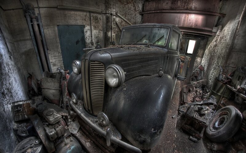 Abandoned Car in Garage — Black, Desolate