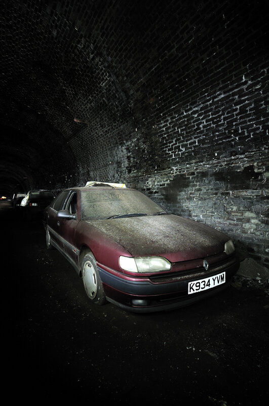 Abandoned car in tunnel
