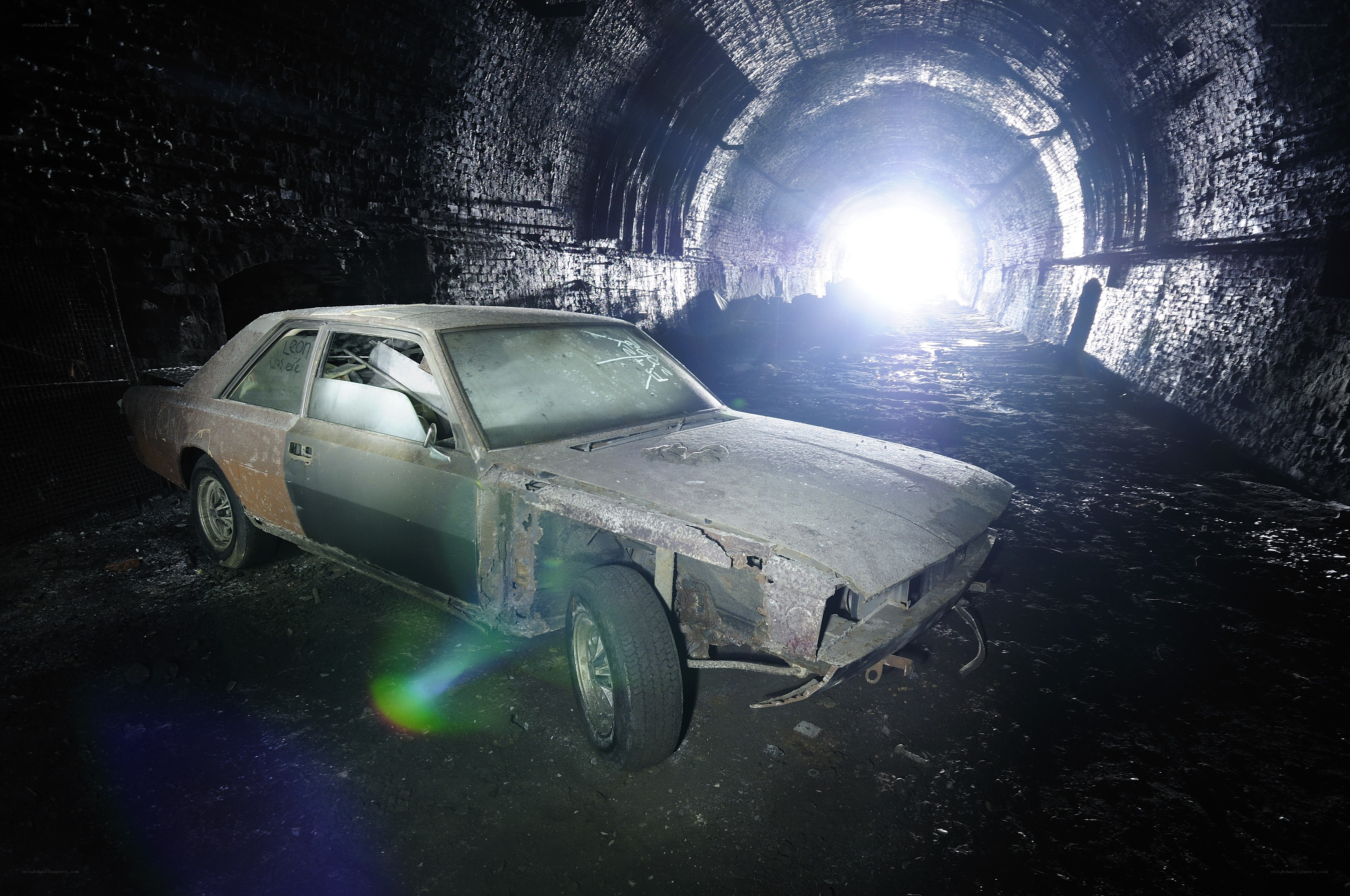 Abandoned car in tunnel