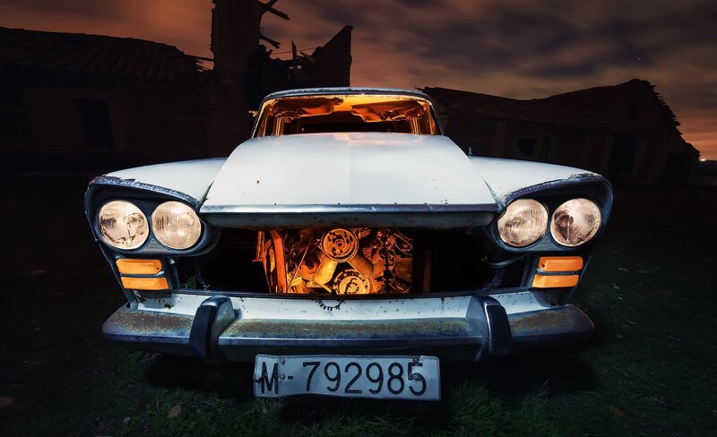 Abandoned Car with Exposed Engine