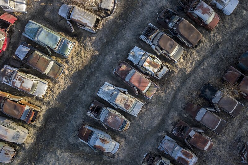 Abandoned Cars in Field — Brown, Desolate