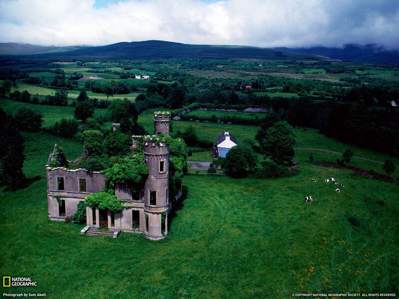 Abandoned castle in green fields
