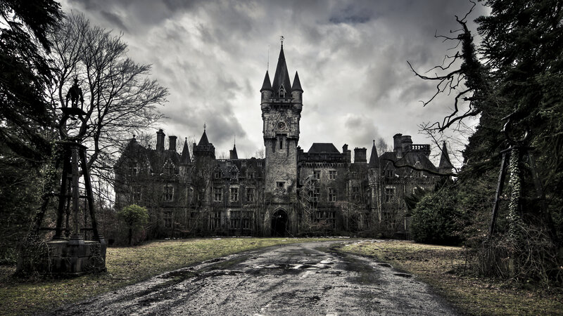 Abandoned castle in overgrown grounds