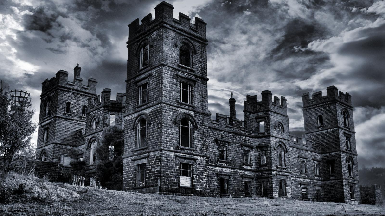 Abandoned castle under stormy sky