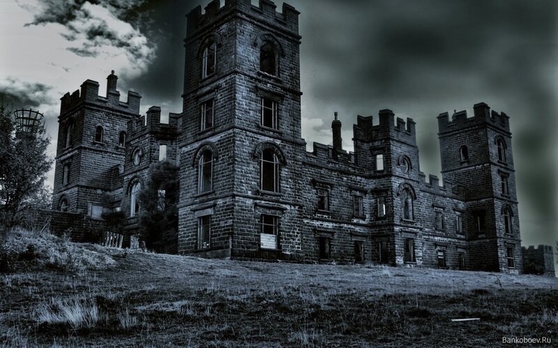 abandoned castle under stormy sky