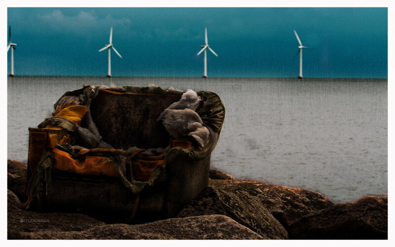 Abandoned chair by the sea