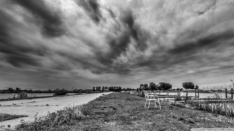 Abandoned Chair on Shore