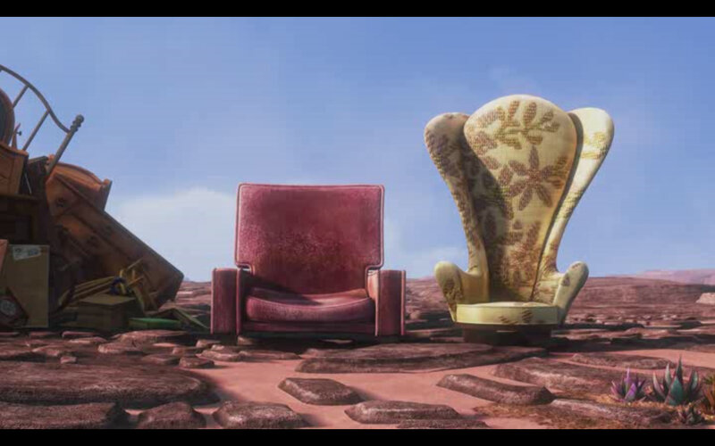 abandoned chairs in desert