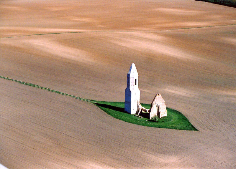 Abandoned church in a field