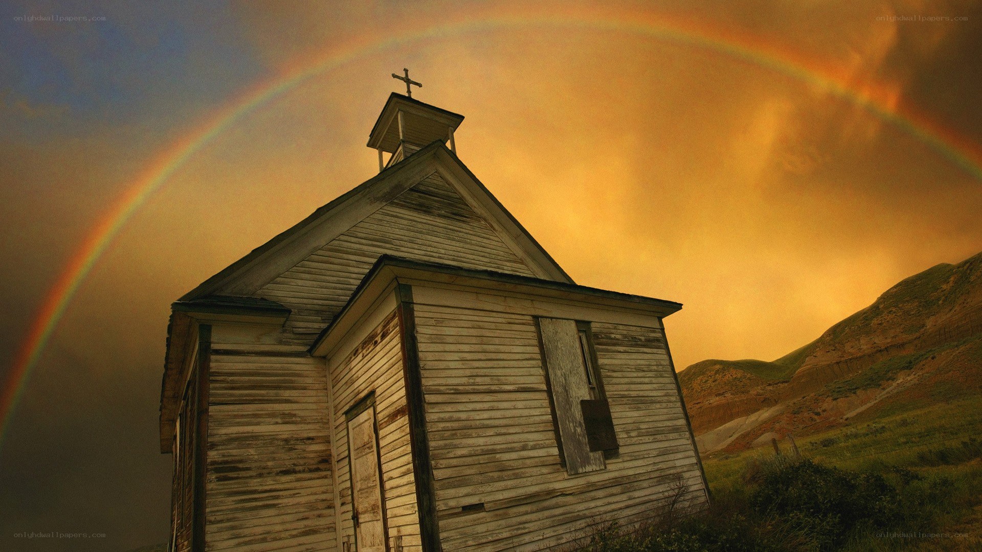 Abandoned church with rainbow