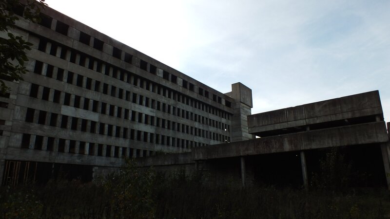 Abandoned Concrete Building — Gray, Desolate