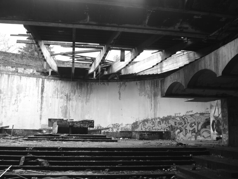 Abandoned Concrete Structure — Black, Desolate