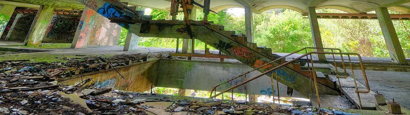 Abandoned Concrete Structure — Green, Decaying, Afternoon