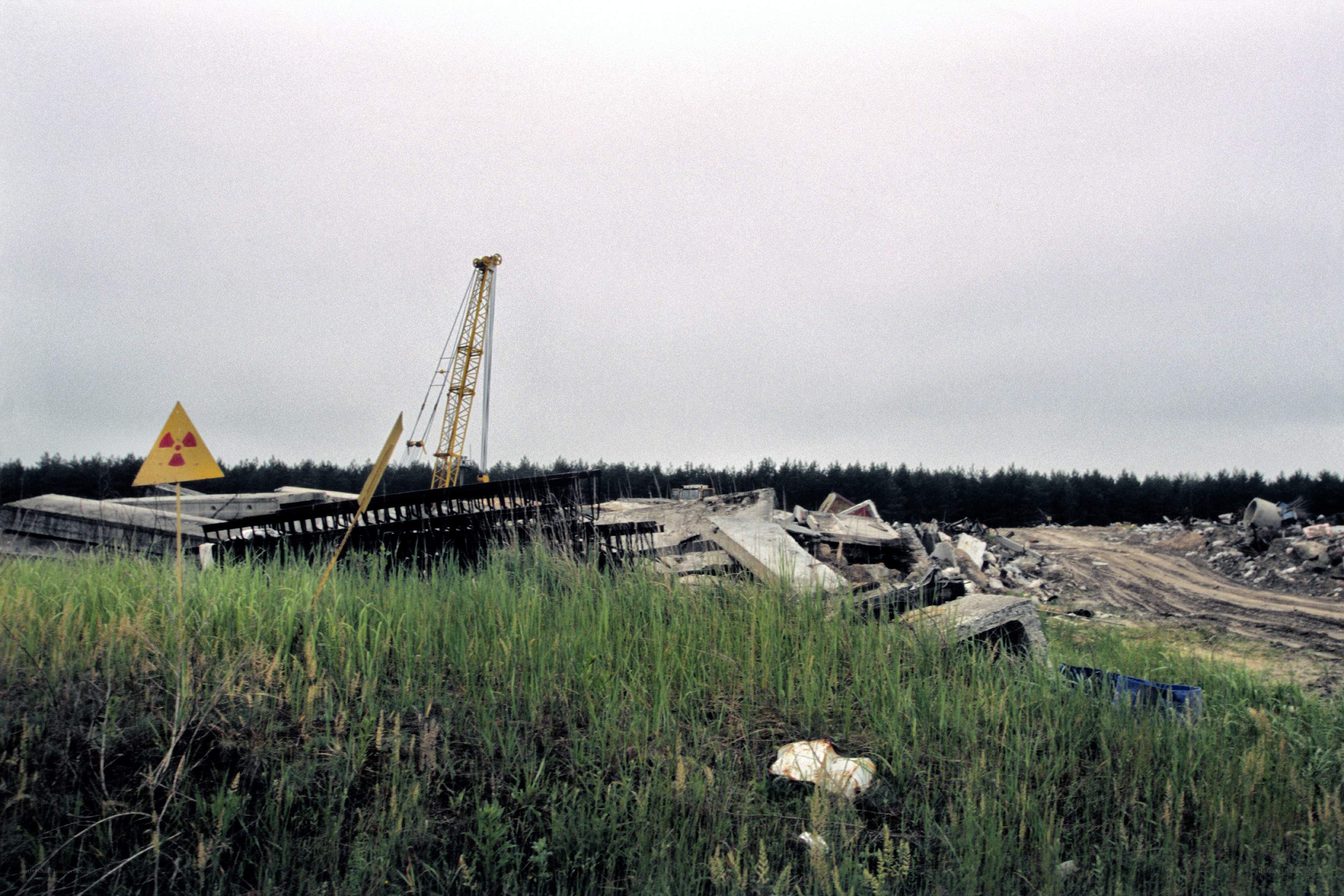 Abandoned construction site with radiation sign