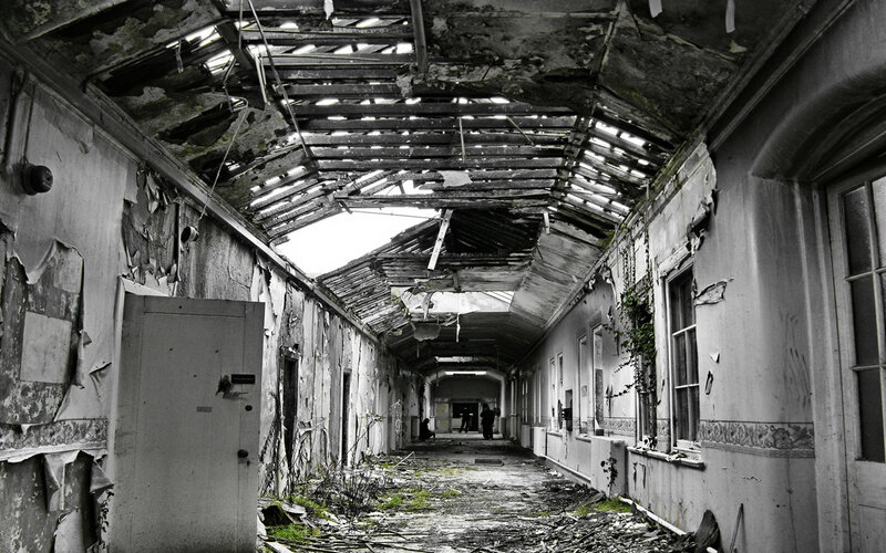 abandoned corridor with collapsed ceiling