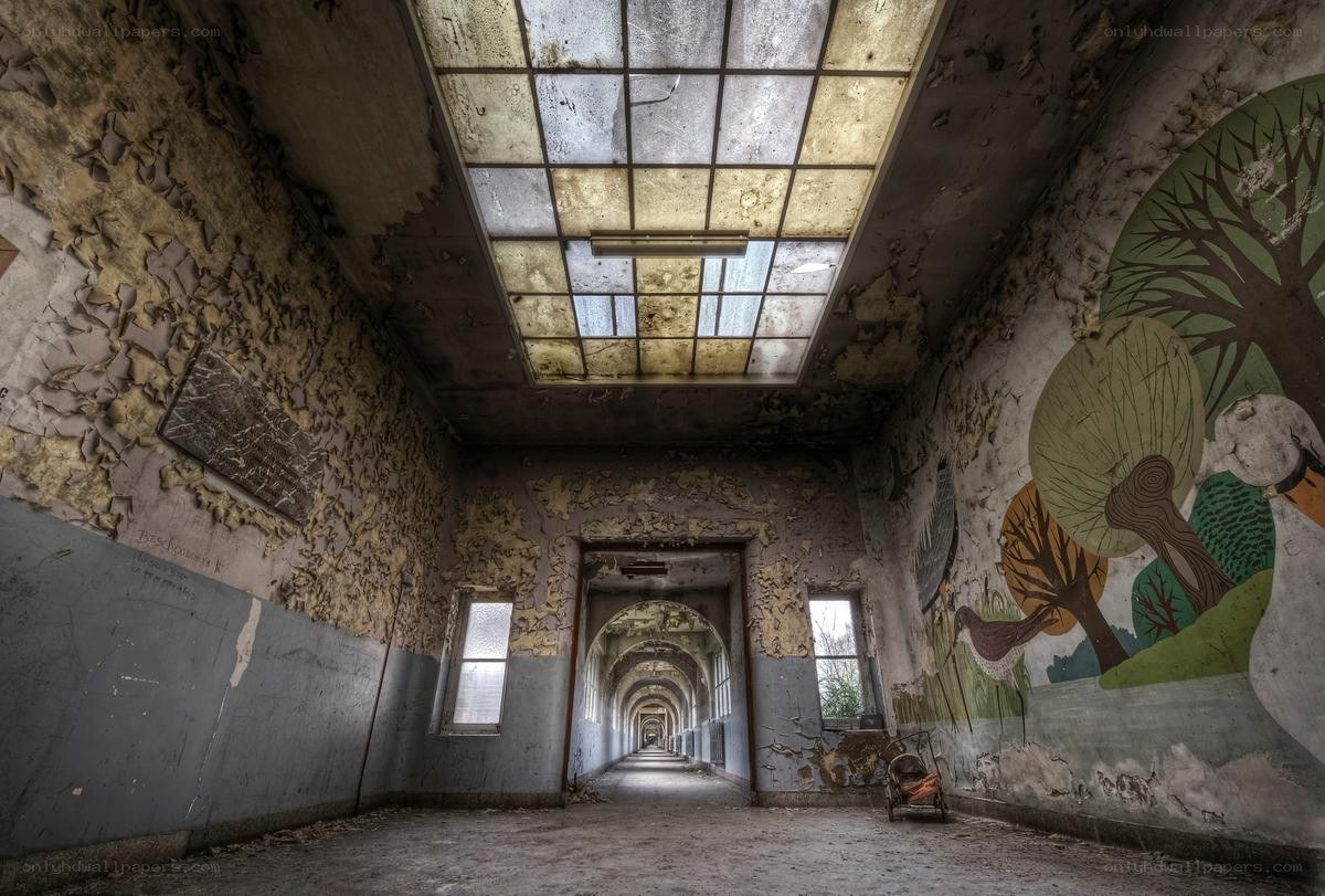 Abandoned corridor with mural