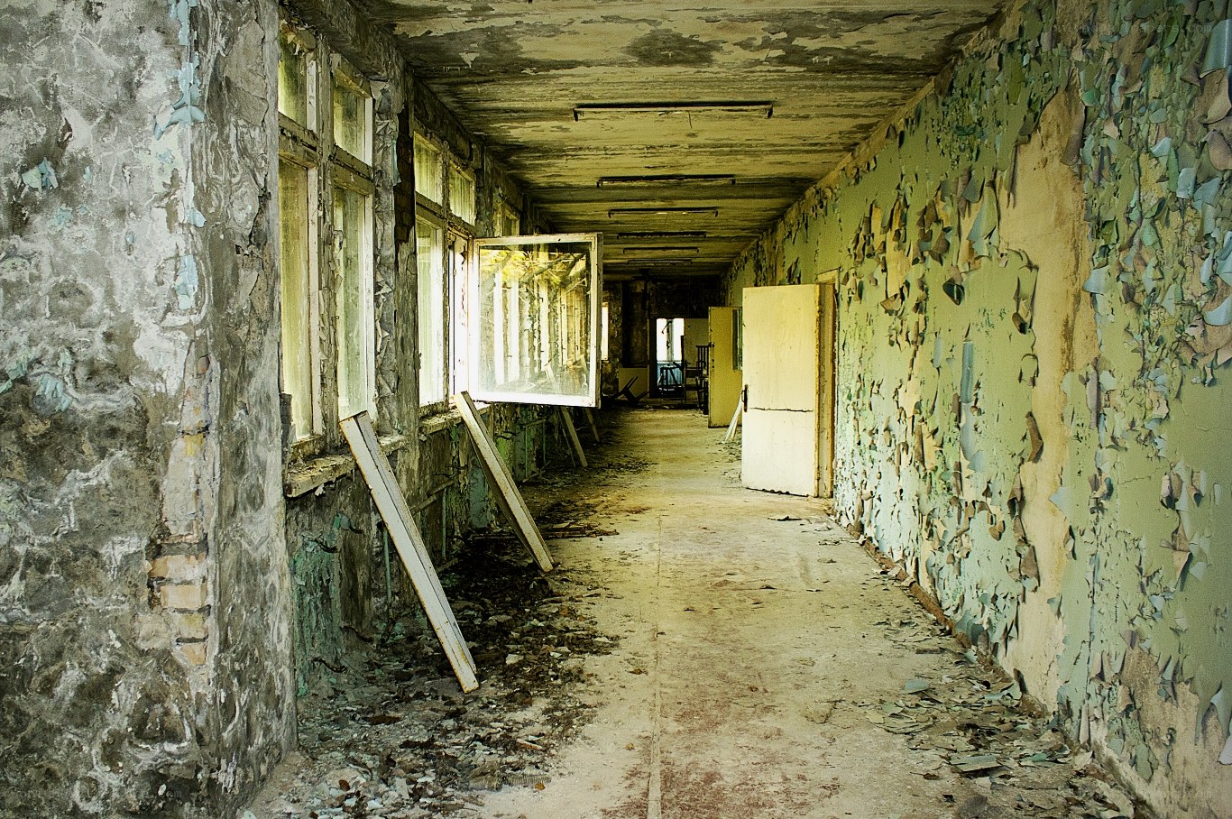 Abandoned corridor with peeling paint