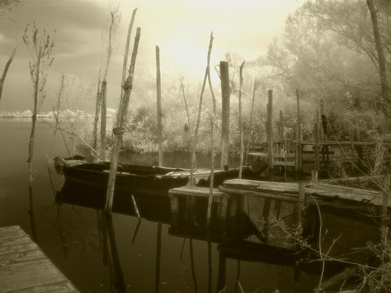 abandoned dock at sunset