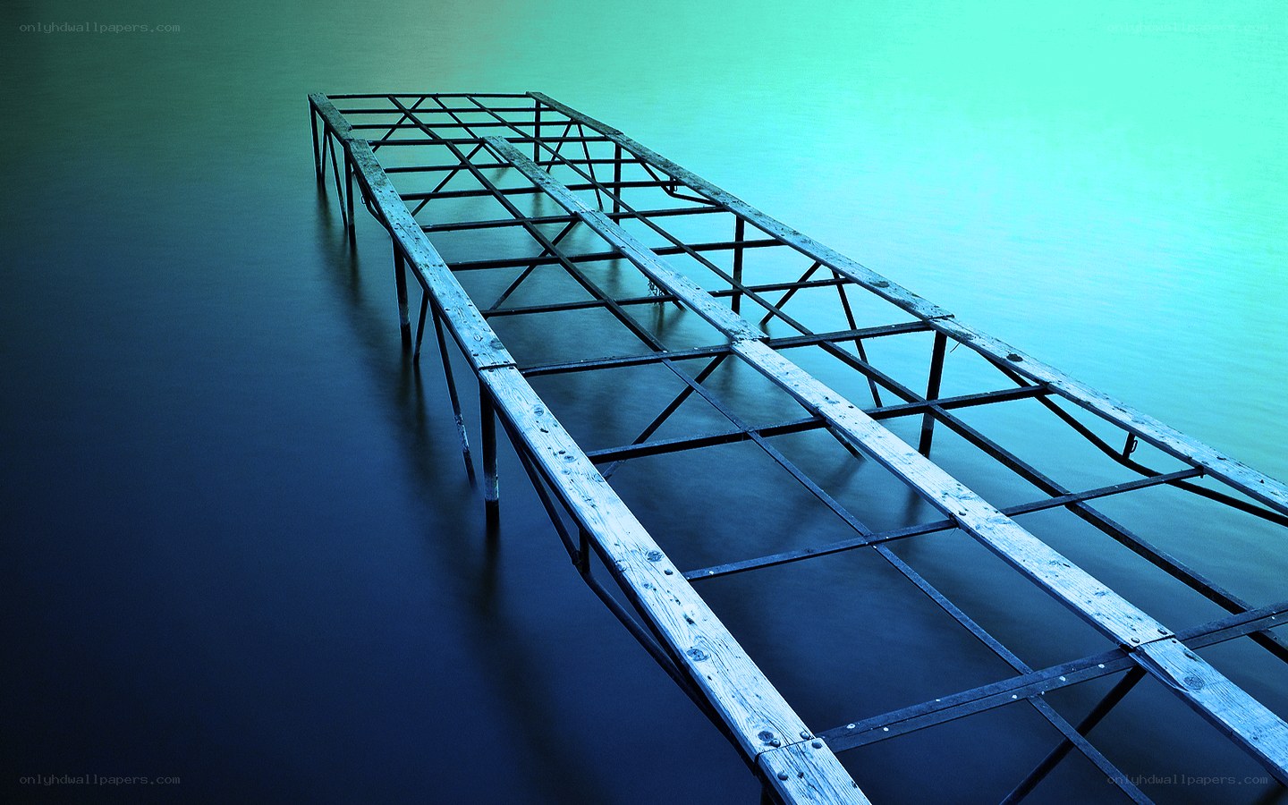 Abandoned dock on calm water