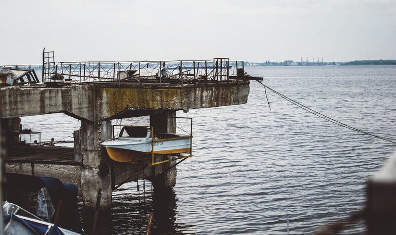 Abandoned Dock with Boat — Gray