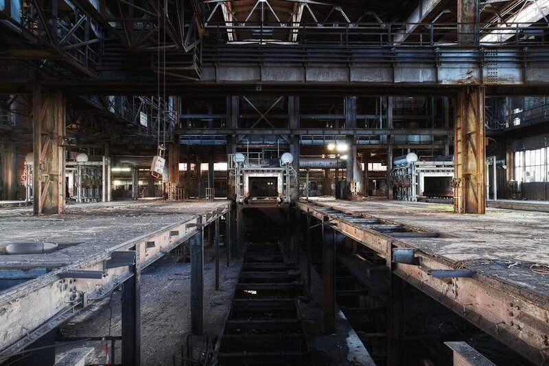 Abandoned Factory Interior — Gray, Desolate, Photograph, Concrete Floor, Steel Beams