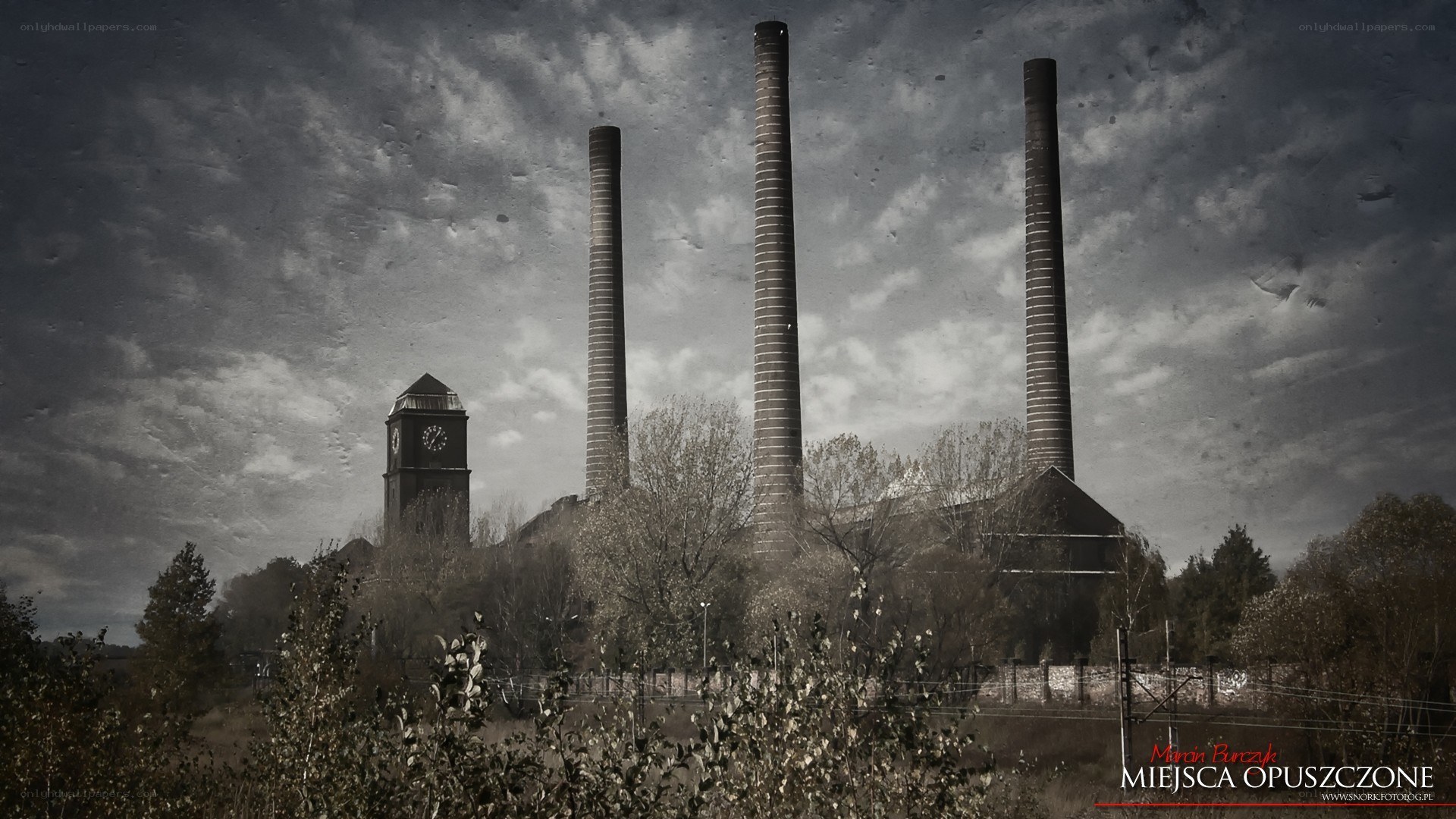 Abandoned factory with smokestacks