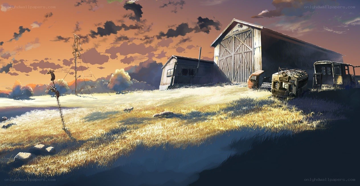 Abandoned farm at sunset