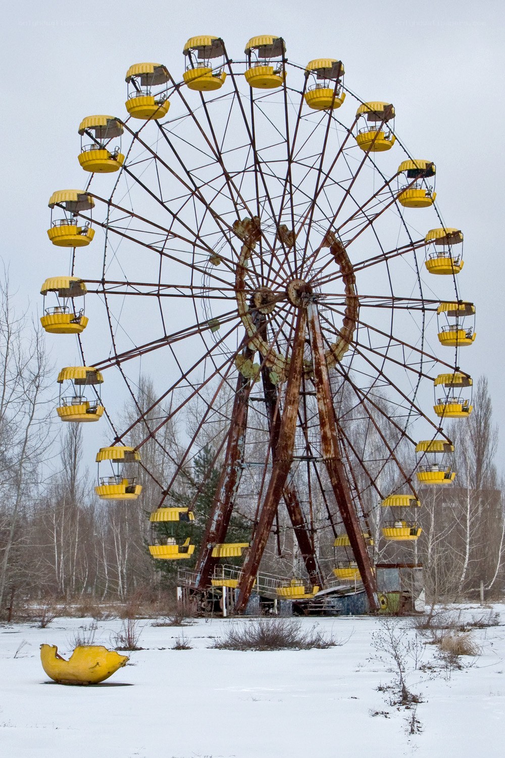 Abandoned Ferris Wheel in Snow