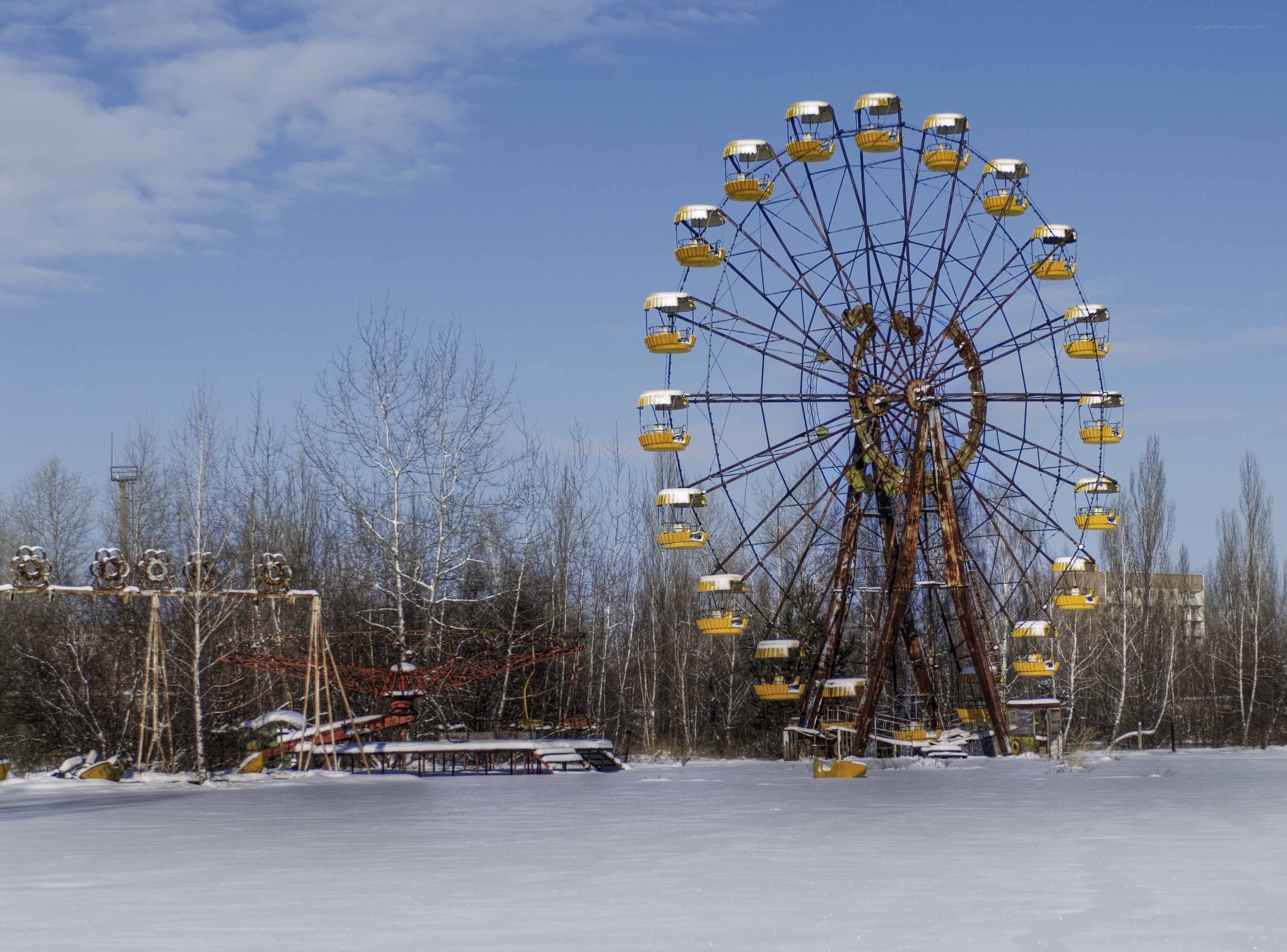 Abandoned Ferris Wheel in Snow