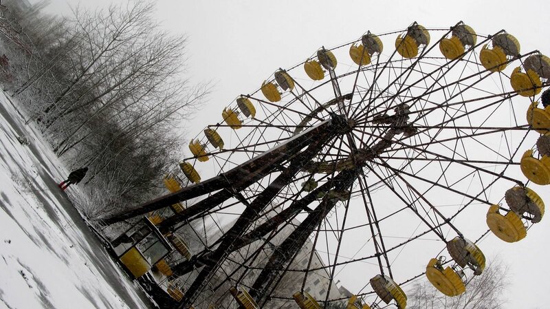 Abandoned Ferris Wheel in Snow
