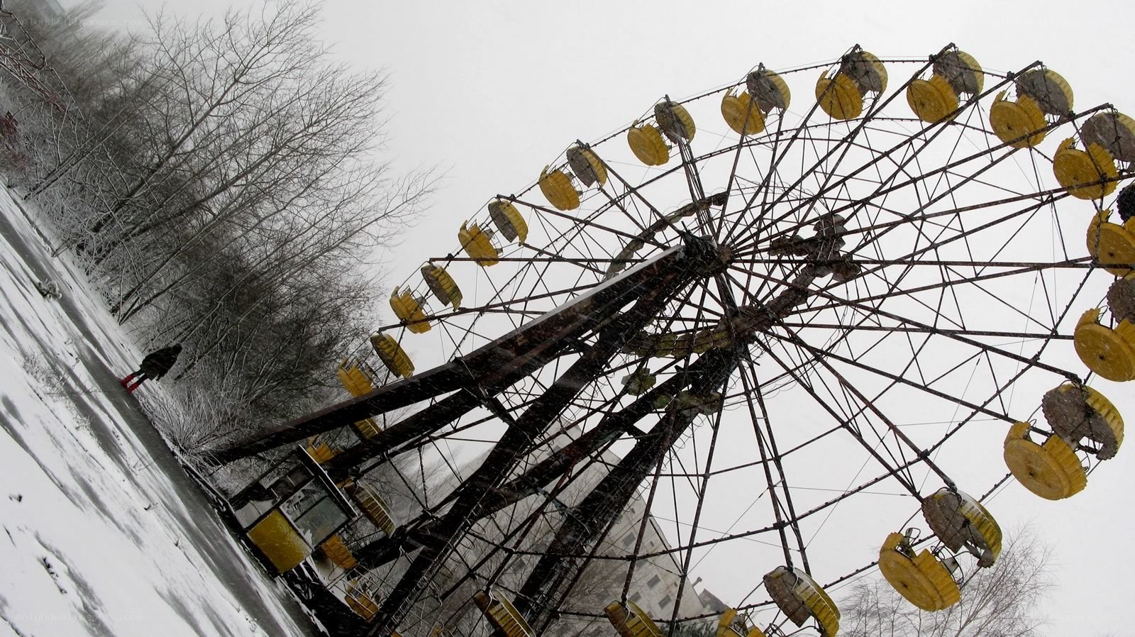 Abandoned Ferris Wheel in Snow