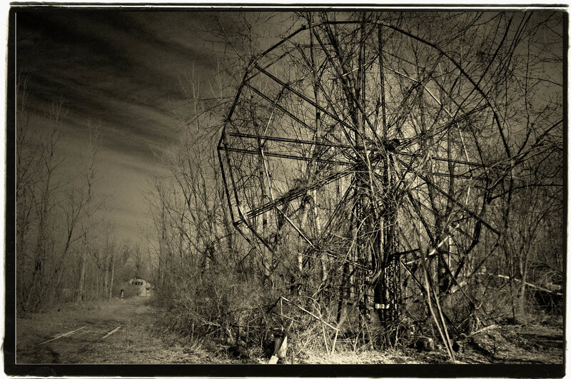Abandoned Ferris Wheel in Woods