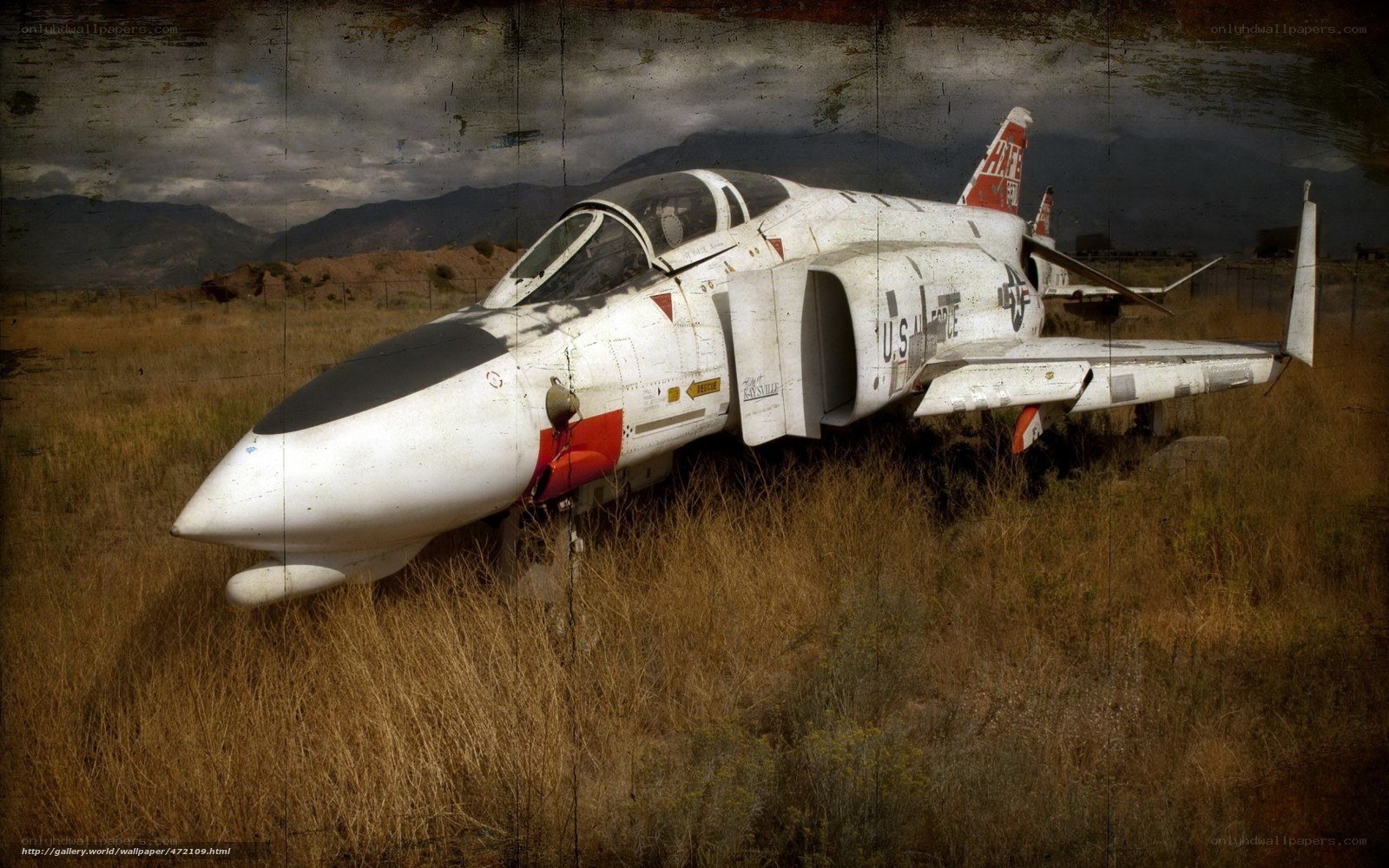 abandoned fighter jet in field
